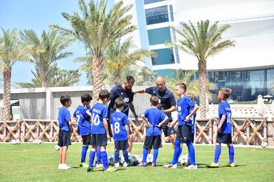 Michael Owen, Jamie Redknapp and Billy Wingrove will coach football at Dubai's Jumeirah Beach Hotel in October. Courtesy Football Escapes 