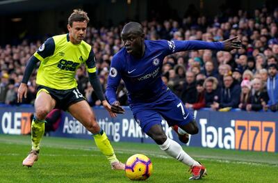 epa07339031 Chelsea's N'Golo Kante (R) vies for the ball against Huddersfield's Chris Lowe (L) during the English Premier League soccer match at Stamford Bridge, London, Britain, 02 February 2019.  EPA/WILL OLIVER EDITORIAL USE ONLY. No use with unauthorized audio, video, data, fixture lists, club/league logos or 'live' services. Online in-match use limited to 120 images, no video emulation. No use in betting, games or single club/league/player publications