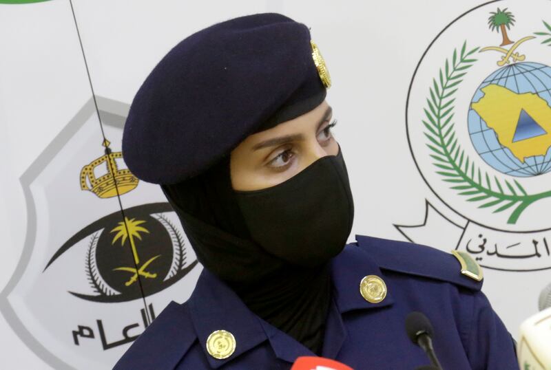 Saudi Arabian police officer Abeer Abdullah on guard during a press conference featuring the head of the Hajj security forces in Mecca. The annual pilgrimage used to draw more than 2 million people but for the second straight year it is curtailed by the coronavirus with only vaccinated people in Saudi Arabia allowed to participate.