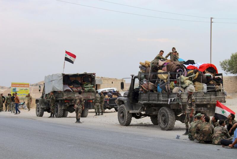 Syrian regime troops on the outskirts of the northern Syrian border town of Kobane after a deal struck with Kurdish authorities during a Turkish offensive. AFP