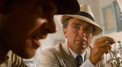 Rene Belloq was Indiana Jones' arch nemesis in Raiders of the Lost Ark, and, like Melania, he sashayed around Cairo in a cream suit - but in 1981. 