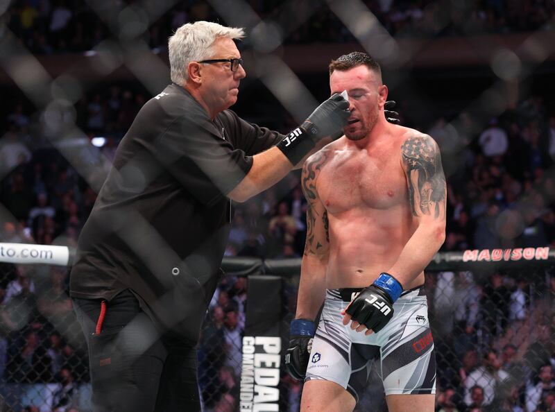 Colby Covington gets cleaned up during his fight against Kamaru Usman. Reuters