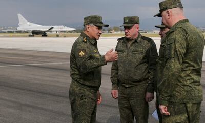 Russian Defence Minister General of the Army Sergei Shoigu inspects the Hmeimim Russian Air Base, south-east of the city of Latakia in Syria. EPA