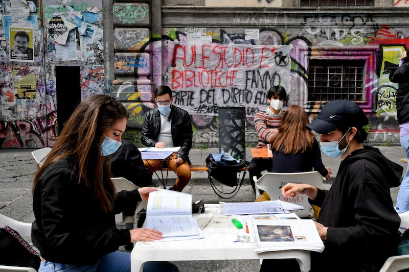 Students work in open-air to protest against distance learning in Naples, Italy. EPA