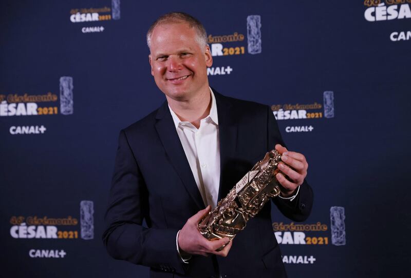 Cinematographer Alexis Kavyrchine poses during a photocall after receiving the Best Photo Award for the film 'Adieu les cons' (Bye Bye Morons) during the 46th Cesar Awards ceremony at the Olympia concert hall in Paris, France. Reuters