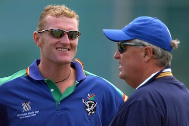 Current UAE coach Dougie Brown, left, was seconded to the Namibia cricket team's coaching staff for the 2003 Cricket World Cup on the advice of Warwickshire coach Bob Woolmer, right. PA