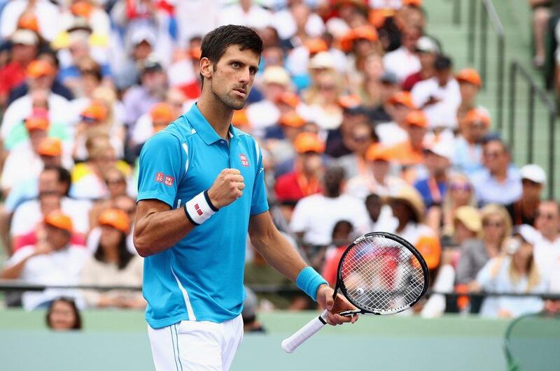 Novak Djokovic of Serbia celebrates a point against Kei Nishikori of Japan in the mens final during the Miami Open Presented by Itau at Crandon Park Tennis Center on April 3, 2016 in Key Biscayne, Florida. Clive Brunskill/Getty Images