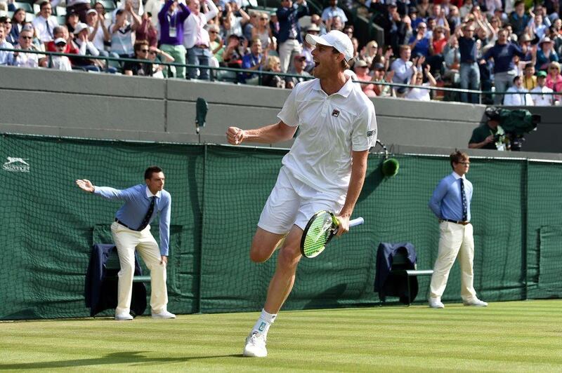 Sam Querrey celebrates after completing his stunning third round victory over world No 1 and two-time defending champion Novak Djokovic. Glyn Kirk / AFP



