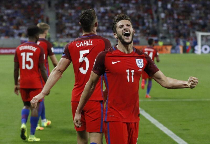 England’s Adam Lallana celebrates scoring their goal with teammates in the European World Cup qualifying win over Slovakia. Carl Recine / Action Images / Reuters