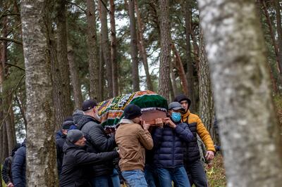 Mourners carry the coffin during a funeral of Yemeni migrant Mustafa Mohammed Murshed Al Raimi, 37, who died just after crossing from Belarus. EPA