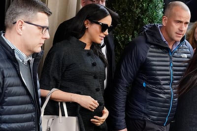  Meghan Markle, Duchess of Sussex, exits a hotel in the Manhattan borough of New York City, New York, U.S., February 19, 2019. REUTERS/Carlo Allegri