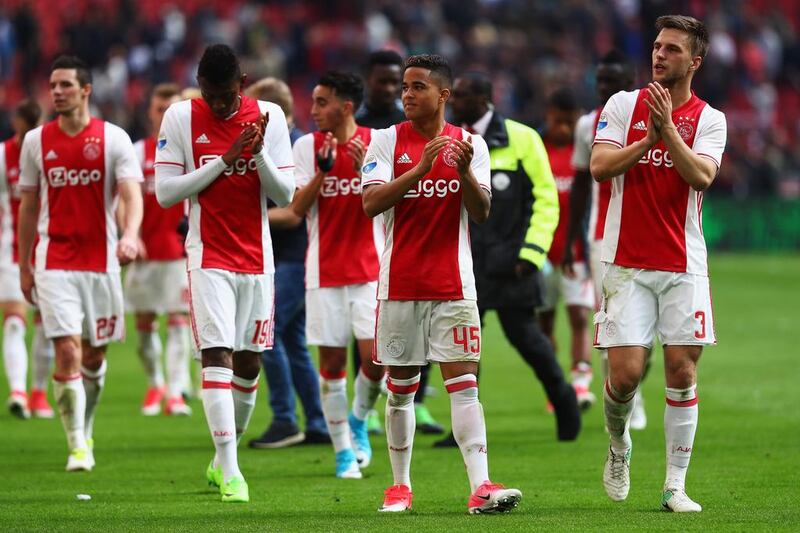 A young Justin Kluivert (No 45) and his Ajax teammates will take on Manchester United in the Europa League final, 22 years after his father Patrick scored the match-winner for the Dutch club in winning the Uefa Champions League in 1995. Dean Mouhtaropoulos / Getty Images