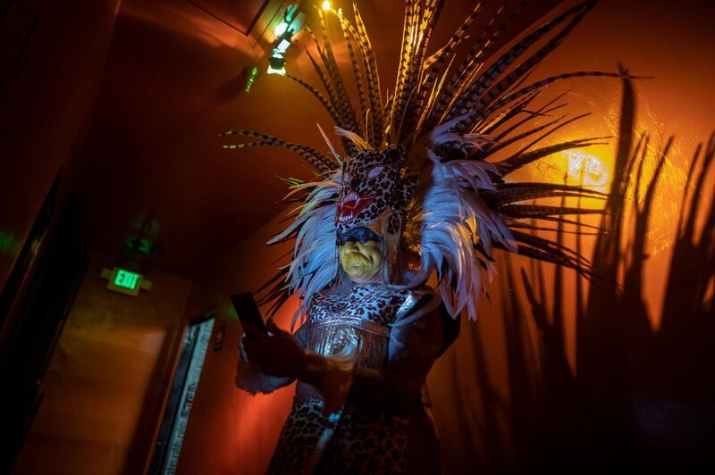 An Aztec dancer waits to go onstage at the Cinco de Mayan show at the Mayan Theatre on the weekend of Cinco de Mayo in Los Angeles, California, USA. EPA