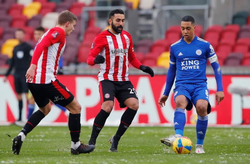 Leicester City's Youri Tielemans under pressure from Saman Ghoddos of Brentford. Reuters