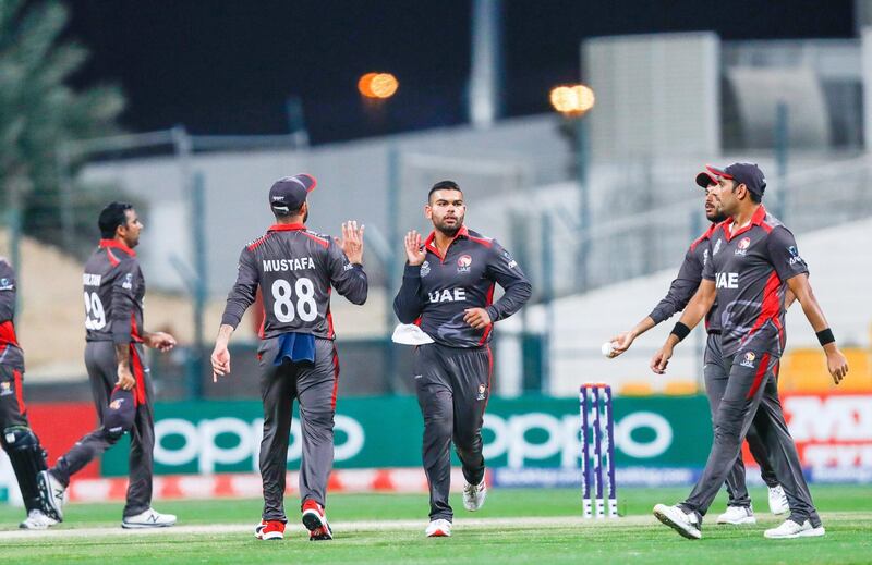 Abu Dhabi, United Arab Emirates, October 27, 2019.  
T20 UAE v Canada-AUH-
--    Team UAE gives high fives during a quick break.
Victor Besa/The National
Section:  SP
Reporter:  Paul Radley