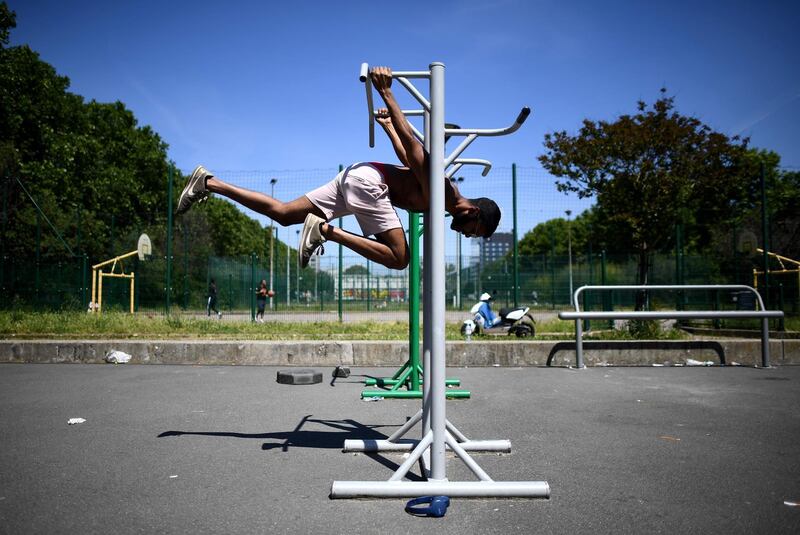 People exercises in Paris,  as France eases lockdown measures taken to curb the spread of the COVID-19 disease.  AFP