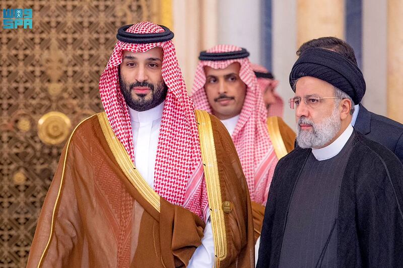 Saudi Crown Prince Mohammed bin Salman, left, and Mr Raisi at a meeting of the Arab League and the Organisation of Islamic Co-operation in Riyadh. AFP