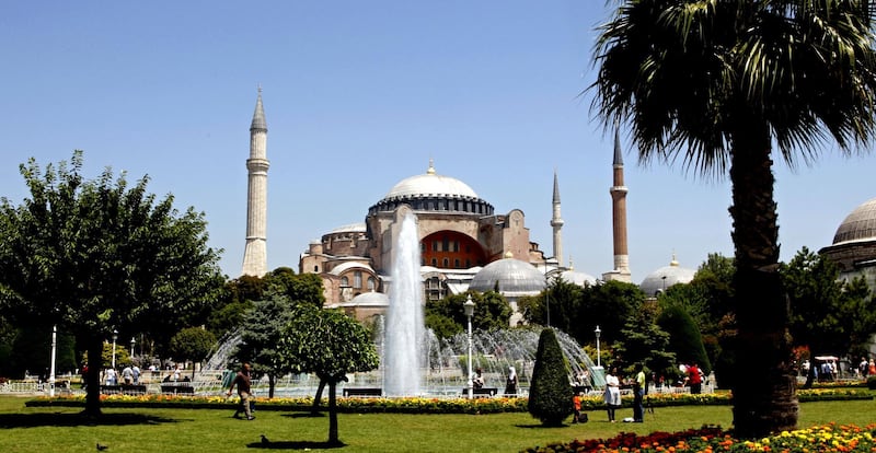 epa01806036 An exterior view of the Hagia Sophia Museum in Istanbul, Turkey, 25 July 2009. Experts have uncovered one of the six angel mosaics at the Hagia Sophia Museum after it had been hidden for 160 years behind plaster and a metal mask. The mosaic, which measures 1,5 meters by 1 meter, was last seen by Swiss architect Gaspare Fossati, who headed restoration efforts at the museum between 1847 and 1849, and Ottoman Sultan Abdulmecid. Experts were surprised to see that the mosaic, believed to date from the 14th century, was so well preserved.  EPA/TOLGA BOZOGLU *** Local Caption *** 01806036