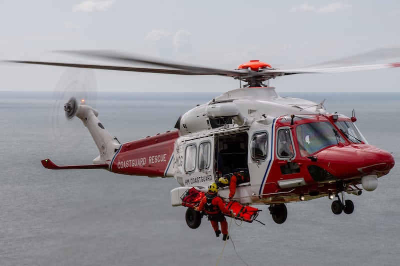 A UK Coastguard helicopter in a training exercise over Dover a day after five migrants drowned making the crossing from France on a small boat. Getty Images