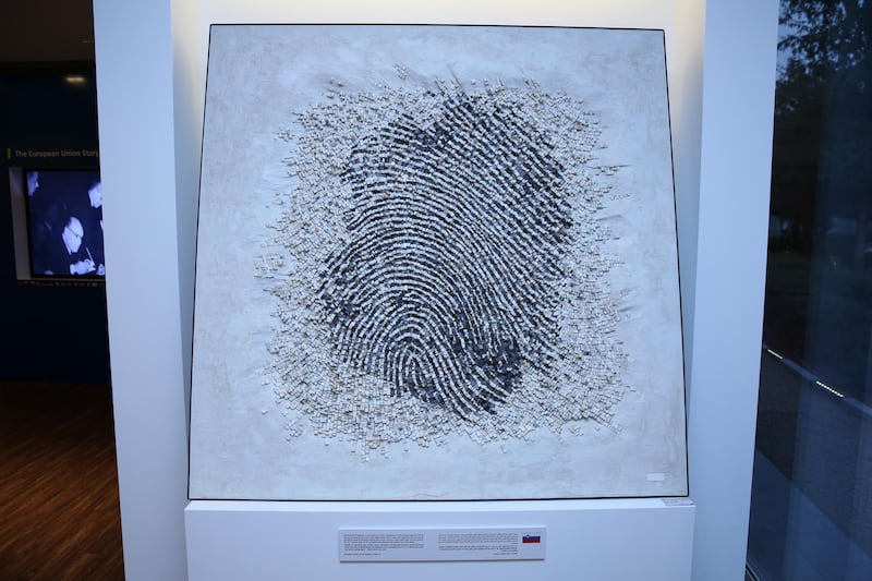 Slovenian artist Aljaz Vidrajz's mosaic, representing Sheikh Zayed's fingerprint on the world, was made using marble, glass, gold and sand from the UAE desert. Courtesy EU Delegation
