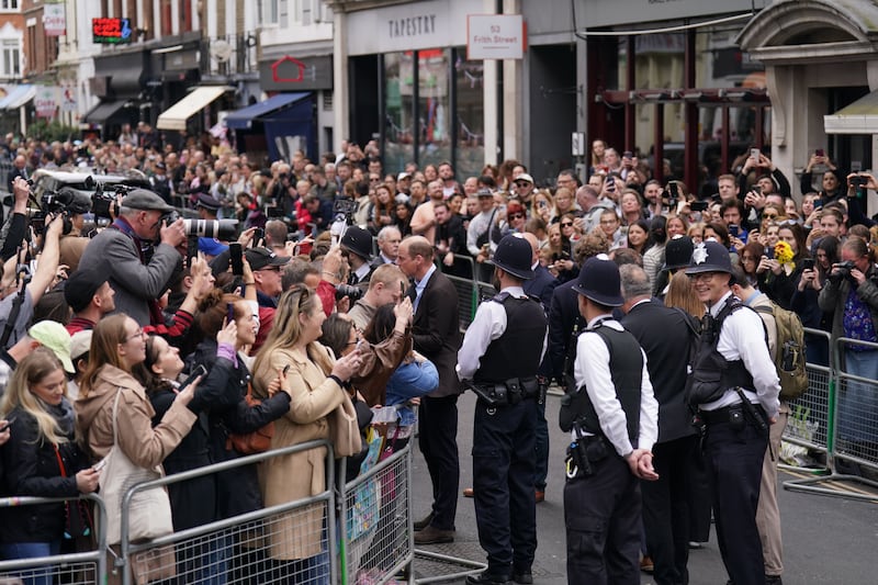 A large crowd gathered in Soho to catch a glimpse of the prince and princess. PA