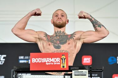 ABU DHABI, UNITED ARAB EMIRATES - JANUARY 22: Conor McGregor of Ireland poses on the scale during the UFC 257 weigh-in on UFC Fight Island on January 22, 2021 in Abu Dhabi, United Arab Emirates. (Photo by Chris Unger/Zuffa LLC)