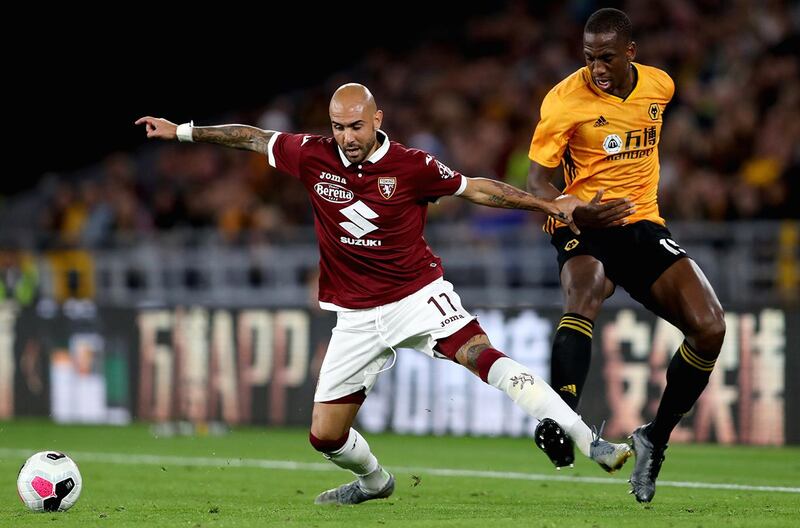 Wolverhampton Wanderers' Wily Boly and Torino's Simone Zaza Wolverhampton Wanderers v Torino - UEFA Europa League - Play-Off - Second Leg - Molineux 29-08-2019 . (Photo by  David Davies/EMPICS/PA Images via Getty Images)