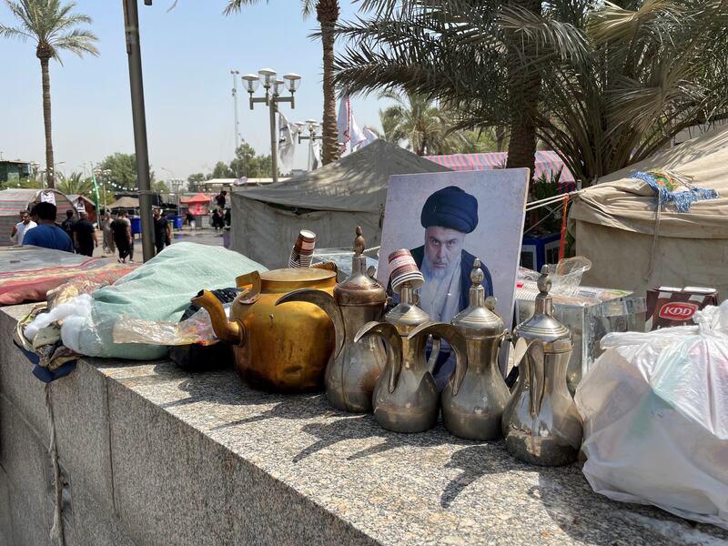 The sit-in outside the parliament is the latest chapter in Iraq’s 10-month political deadlock over forming the new government since elections in October. 