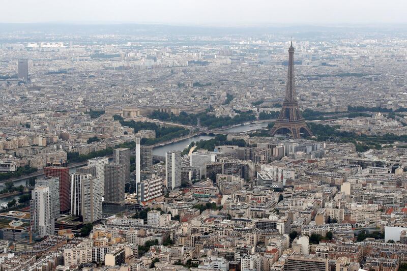 An aerial view shows the Eiffel tower, the Seine River and the Paris skyline, France, July 14, 2019. REUTERS/Philippe Wojazer