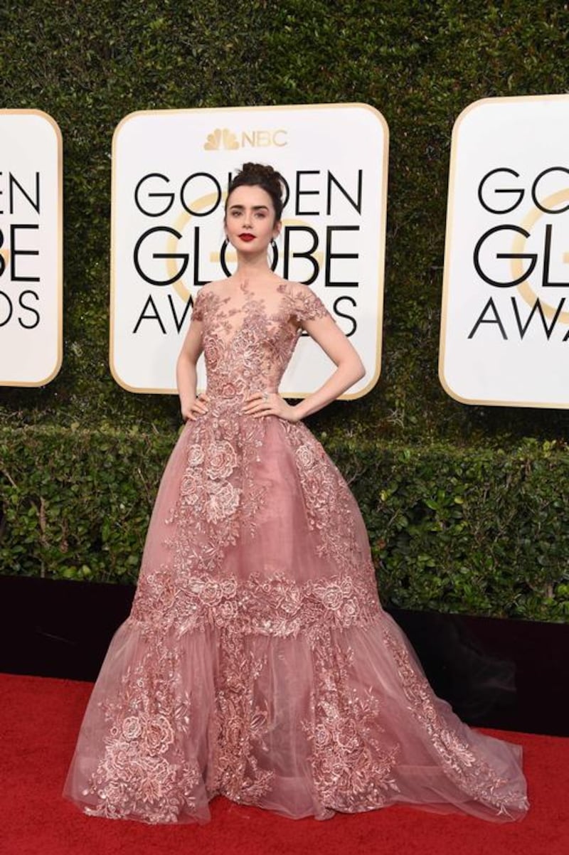 Lily Collins wears Zuhair Murad at the 2017 Golden Globes Awards. Courtesy of Valerie Macon / AFP