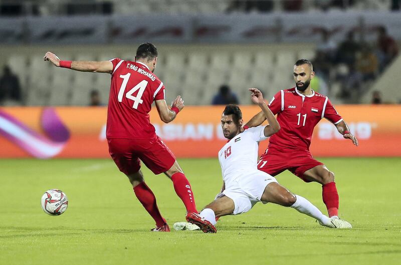 SHARJAH , UNITED ARAB EMIRATES , January  6 – 2019 :- Sameh Maraaba ( no 10 in white ) of Palestine in action during the AFC Asian Cup UAE 2019 football match between Syria vs Palestine held at Sharjah Football Stadium in Sharjah. ( Pawan Singh / The National ) For News/Sports