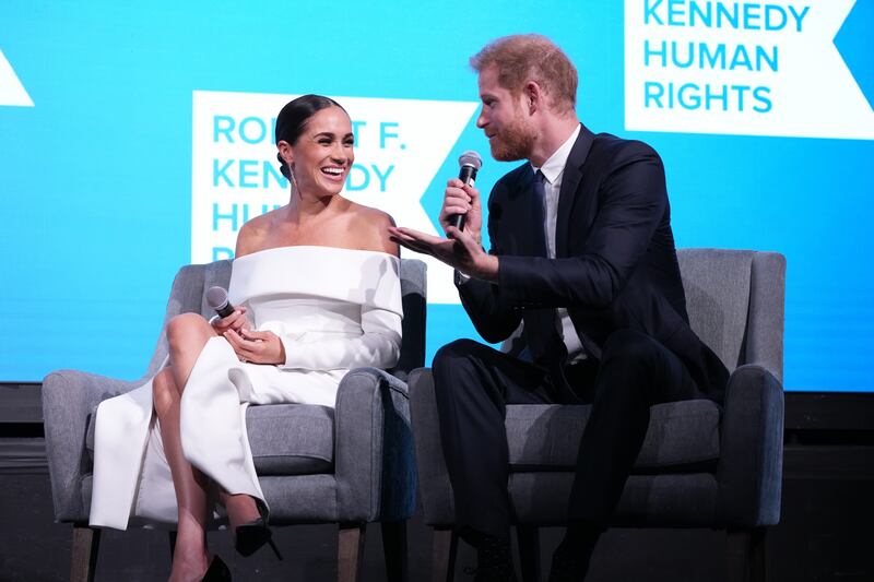 The royal couple speak onstage at the Robert F Kennedy Human Rights Ripple of Hope Gala in New York in December 2022. Getty