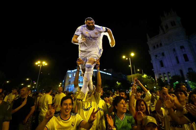 Real Madrid supporters celebrate in Cibeles Square in downtown Madrid, at the end of the Champions League final victory against Liverpool. AFP