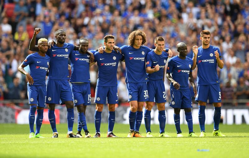 Chelsea players watch during the penalty shootout. Hannah McKay / Reuters