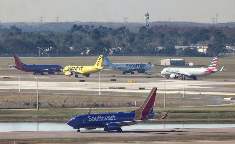 Planes wait for takeoff at Orlando International Airport in Florida. AP