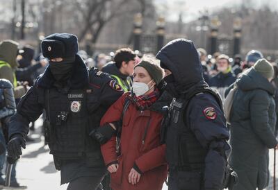 Russian policemen detain a participant in a rally against the invasion of Ukraine in Moscow. EPA 