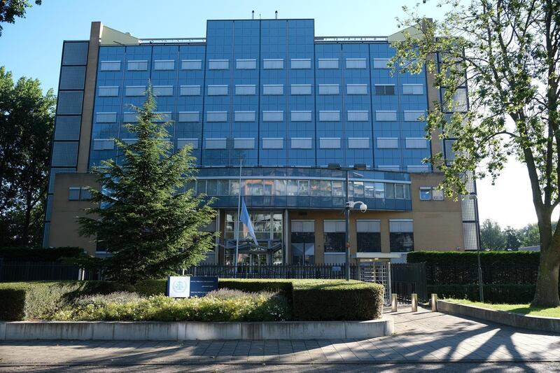 The flag flies at half staff outside the Special Tribunal for Lebanon, in Leidschendam, the Netherlands, Wednesday Aug. 5, 2020, following Tuesdayâ€™s explosion in Beirut. Experts and video footage suggest that fireworks and ammonium nitrate were the fuel that ignited a massive explosion that rocked the Lebanese capital of Beirut on Tuesday. (AP Photo/Mike Corder)