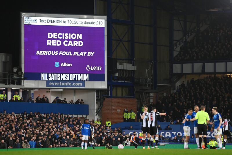 The big screen confirms red card decision against Allan. Getty