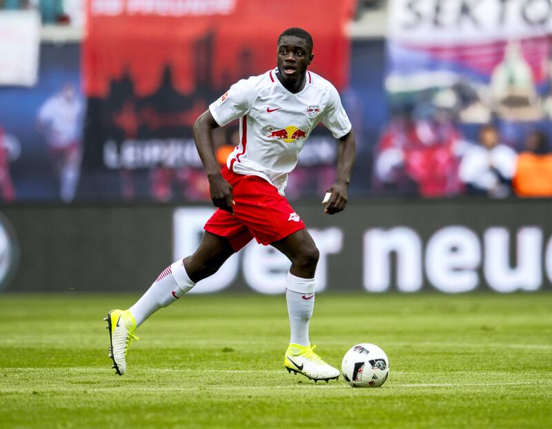 Leipzig´s French defender Dayot Upamecano plays the ball during the German first division Bundesliga football match between RB Leipzig and FC Ingolstadt 04 in Leipzig, eastern Germany on April 29, 2017.  / AFP PHOTO / ROBERT MICHAEL / RESTRICTIONS: DURING MATCH TIME: DFL RULES TO LIMIT THE ONLINE USAGE TO 15 PICTURES PER MATCH AND FORBID IMAGE SEQUENCES TO SIMULATE VIDEO. == RESTRICTED TO EDITORIAL USE == FOR FURTHER QUERIES PLEASE CONTACT DFL DIRECTLY AT + 49 69 650050
