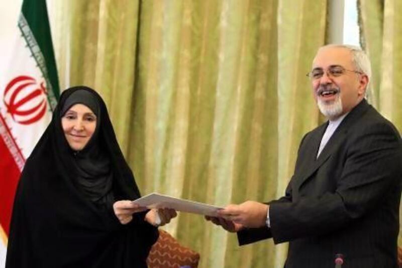 Iranian foreign minister Mohammad Javad Zarif (right) introduces Marzieh Afkham (left) as spokeswoman of the foreign ministry during a ceremony in Tehran.