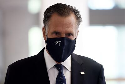 US Senator Mitt Romney, Republican of Utah, heads into a Republican policy lunch on Capitol Hill in Washington on July 21, 2020. / AFP / Olivier DOULIERY
