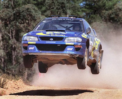 Colin McRae of Great Britain in full flight on his way to winning Rally Australia in Perth 02 November.  McRae won by six seconds over defending World Champion Tommi Makinen of Finland.  McRae's overall time was four hours, five minutes and 31 seconds.  AFP PHOTO / AFP PHOTO / GREG WOOD