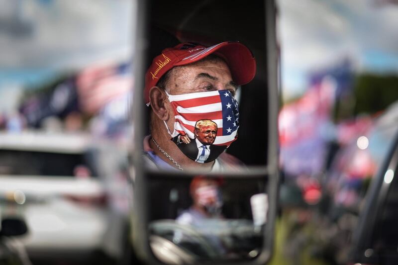 Demonstrators participate in 'Latinos for Trump' demonstration, a parade in support of US President Donald Trump, at Tamiami Park in Miami, US.  EPA