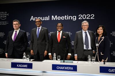 From left, Pfizer chief executive Albert Bourla, Rwanda's President Paul Kagame, Malawi’s President Lazarus Chakwera, philanthropist and co-chair of the Bill & Melinda Gates Foundation Bill Gates and Pfizer group president Angela Hwang, at the World Economic Forum in Davos. AFP