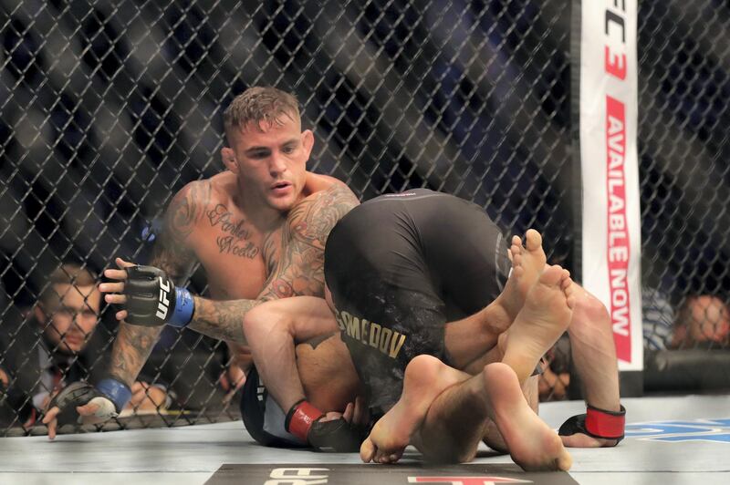 Abu Dhabi, United Arab Emirates - September 07, 2019: Lightweight title bout between Khabib Nurmagomedov (black shorts, winner) and Dustin Poirier in the main event at UFC 242. Saturday the 7th of September 2019. Yas Island, Abu Dhabi. Chris Whiteoak / The National