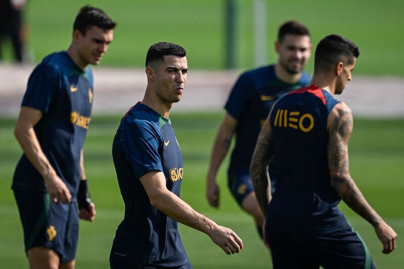 Cristiano Ronaldo arrives for a training session at Shahaniya Sports Club. AFP