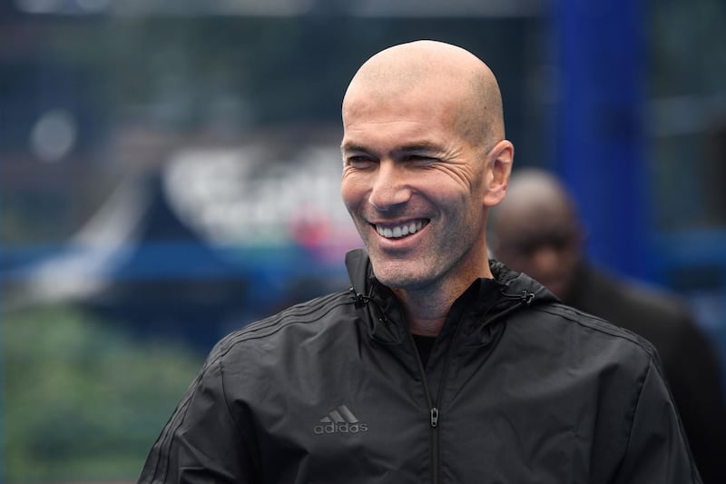 Former French football player Zinedine Zidane smiles on June 11, 2018 in Saint Denis, suburban Paris, as he attends an event marking the 20th anniversary of France's 1998 World Cup victory. / AFP / Eric FEFERBERG
