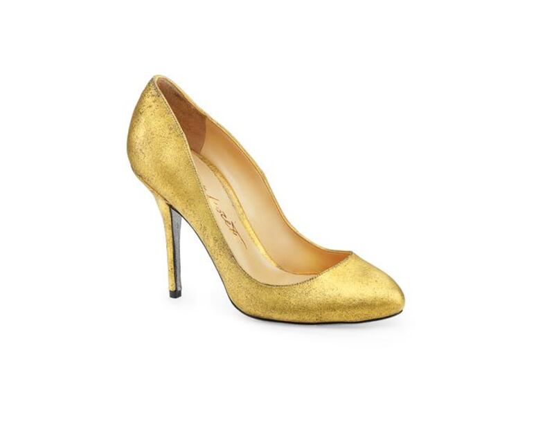 The world’s first 24-carat gold velvet high heeled pump for women retails at Dh12,000, at Level Shoe District, the world’s largest shoe store in Dubai Mall. Courtesy Level Shoe District