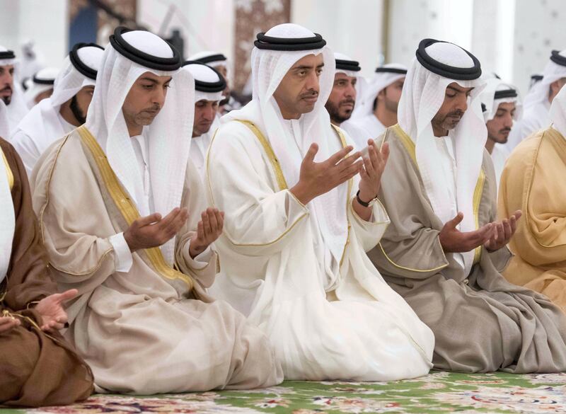 ABU DHABI, UNITED ARAB EMIRATES - September 01, 2017: (L-R) HH Sheikh Omar bin Zayed Al Nahyan, Deputy Chairman of the Board of Trustees of Zayed bin Sultan Al Nahyan Charitable and Humanitarian Foundation, HH Sheikh Abdullah bin Zayed Al Nahyan, UAE Minister of Foreign Affairs and International Cooperation and HH Sheikh Hamed bin Zayed Al Nahyan, Chairman of the Crown Prince Court of Abu Dhabi and Abu Dhabi Executive Council Member, attend Eid Al Adha prayers at the Sheikh Zayed Grand Mosque.

( Hamad Al Kaabi / Crown Prince Court - Abu Dhabi )
—