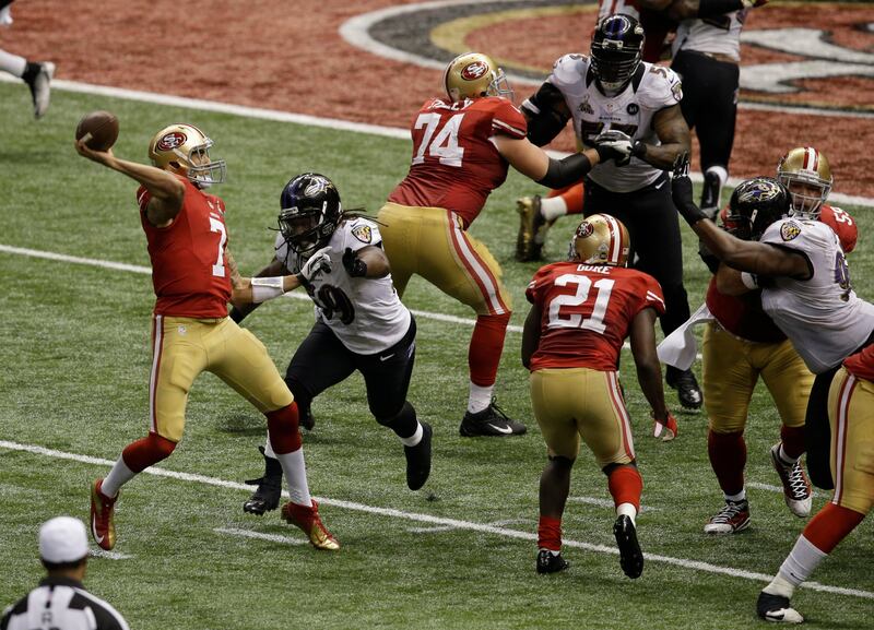 San Francisco 49ers quarterback Colin Kaepernick (7) throws a pass as Baltimore Ravens linebacker Dannell Ellerbe (59) rushes in during the second half of the NFL Super Bowl XLVII football game, Sunday, Feb. 3, 2013, in New Orleans. The pass was incomplete. (AP Photo/Gerald Herbert)  *** Local Caption ***  Super Bowl Football.JPEG-088e9.jpg